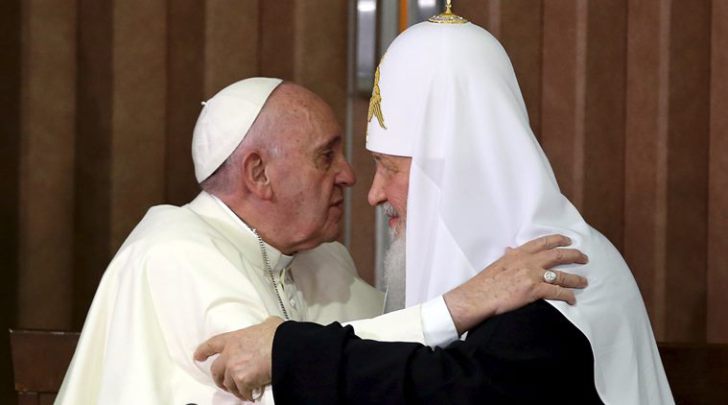 Pope Francis (L) and Russian Orthodox Patriarch Kirill hug each other after signing agreements in Havana, February 12, 2016. REUTERS/Alejandro Ernesto/Pool